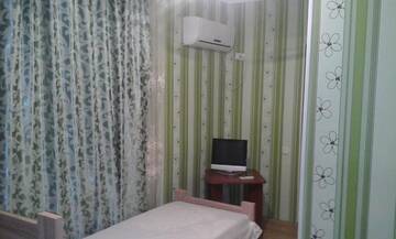 Фото номера Стандартный трехместный номер Отель Hotel in Reni Comfort г. Рени 3