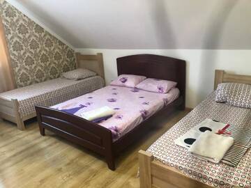 Фото номера Стандартный четырехместный номер Отель Hotel in Reni Comfort г. Рени 3